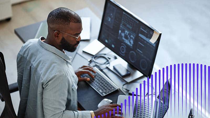 man looking at laptop