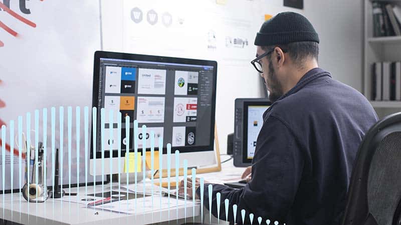 designer looking at computer