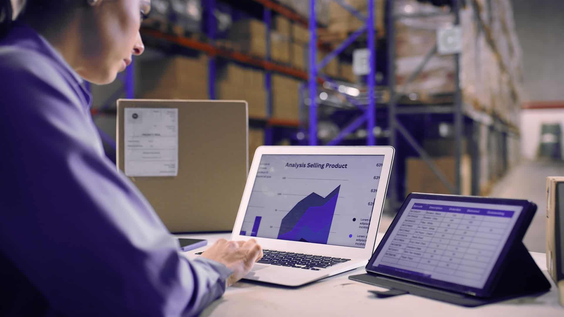 warehouse worker with laptop