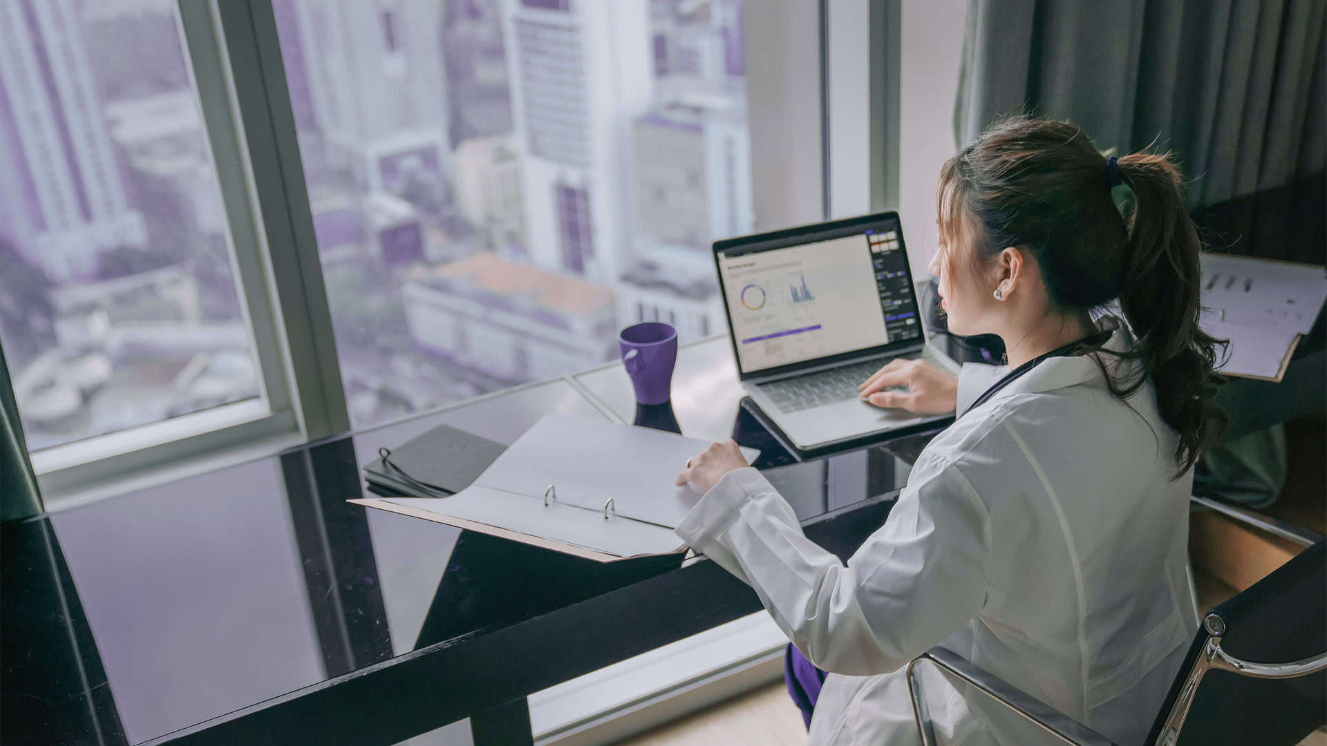 doctor looking at computer