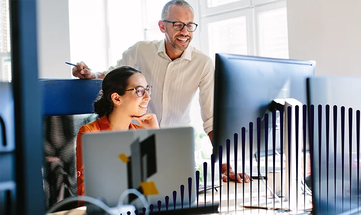 people looking at computer