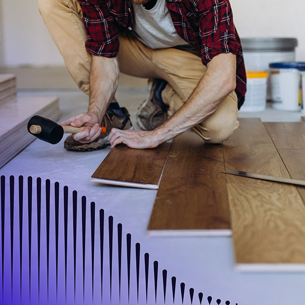 Man installing floorboards