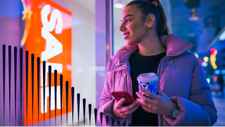 woman looking at sale sign