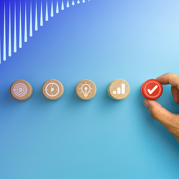 Five circular icon blocks with a hand placing the last one