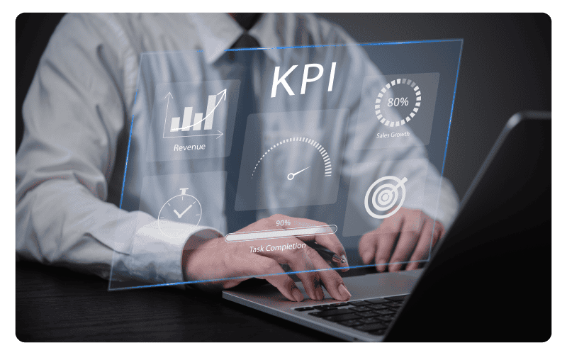 Person typing on laptop with KPI dashboard floating above it